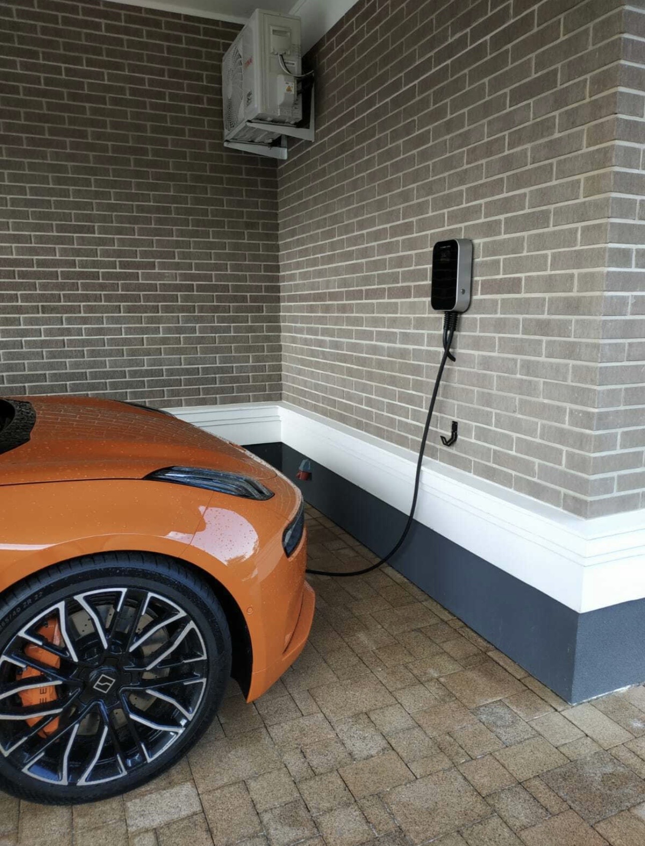 Electrician performing EV charger installation